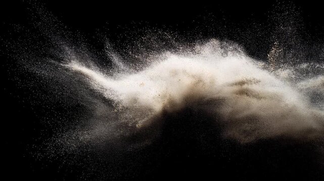 Black cloud particles with white powder burst concept. Abstract representation of dynamic movement and contrasting colors in a dark background.