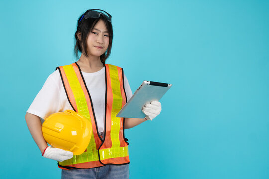 Portrait Engineer Woman Asian Young Teen with safety reflective vest isolated model with tablet
