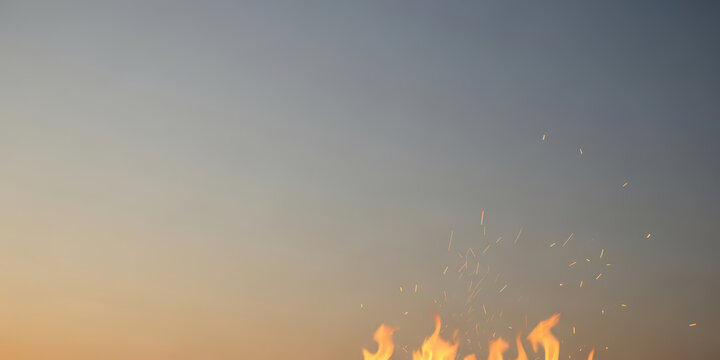 Fire flame ember ash particle flying warm burn burning war with glowing sky dusk horizon soft light outdoor campfire heat energy nature background