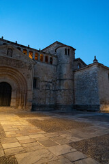 Obraz premium Historic stone building illuminated at dusk.. Santillana del Mar, Santander, Spain