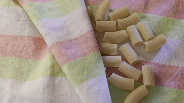Tubular pasta mezze maniche ready for cooking