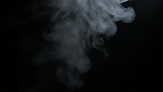 Abstract white smoke rising against a black backdrop for visual effects