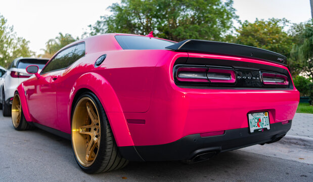 Miami, Florida, USA - April 13, 2025: Sport car Dodge Challenger SRT Hellcat. Car Dodge Challenger SRT parked. Red sportscar, front corner view. 2018 Dodge Challenger SRT Hellcat sportscar car