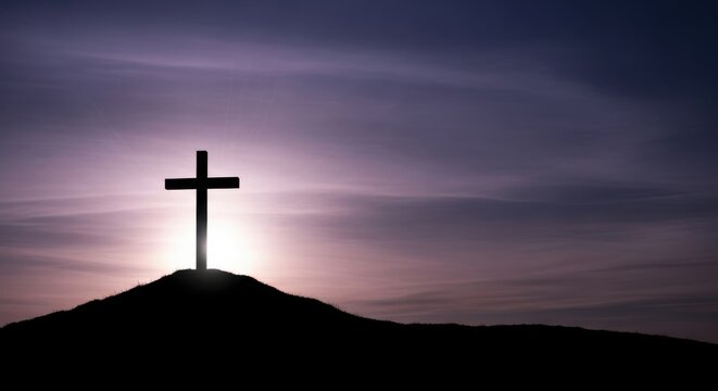 Dramatic silhouette of the christian cross standing on a hill, backlit by a somber purple sky, representing the spiritual sacrifice of good friday.
