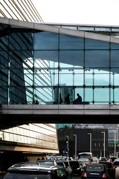 Busy traffic with car flow on modern bridge street in Copenhagen Denmark framing city architecture and daily transport movement at rush hour