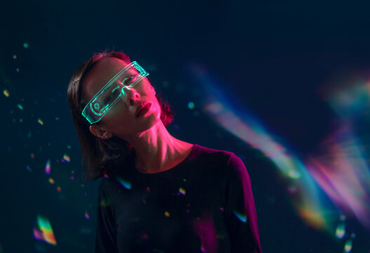 Glowing virtual reality glasses with light effects indoors