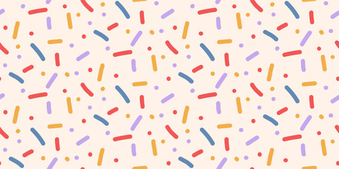 Small dash seamless pattern. Background baby with confetti sprinkles. Birthday cakes topping vector design. Simple repeat texture for print. Design for baby parties, bakery themes in pastel colors.