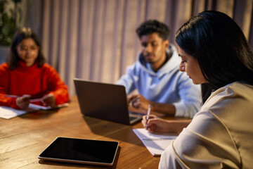 Coworkers collaborating on project during office meeting. Concept of professional teamwork, communication, idea exchange, planning process, business cooperation, and modern office environment.