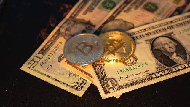 Bitcoin BTC coin with 100 dollars bills. Digital crypto coin and cryptocurrency. Investments for the investor. Concept of exchange market and online trading. Trading in bull and bear markets