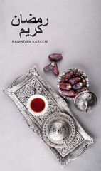 Ramadan background with dates fruits and Arabic text Ramadan Kareem meaning Blessed Ramadan