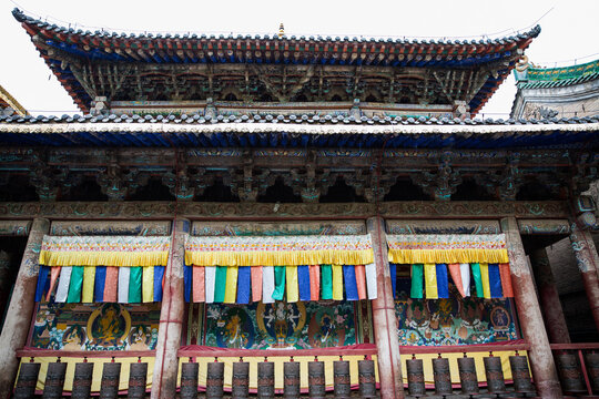 Traditional Buddhist Temple with Colorful Prayer Flags in Xining, China