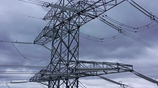 High voltage power line insulators and cable connections close up