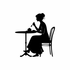 Fototapeta premium Silhouette of a beautiful woman eating cake at a cafe table
