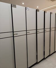 lockers in the locker room for personal items, sports locker room

