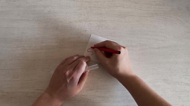 Hand Writing STOP on Sticky Note Red Marker Warning Concept