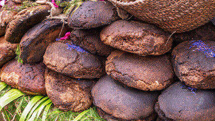 Stacked loaves of traditional dark rye bread