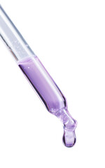 glass pipette with serum drop on transparent background