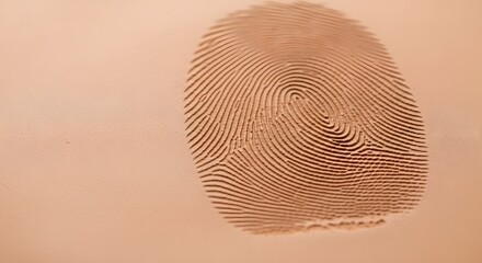 Macro of a unique fingerprint deeply impressed in clay, illustrating a security and identity concept with intricate detail