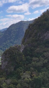 Aerial Drone Shot Rising Over Lush Tropical Mountains in Khao Yai Thailand