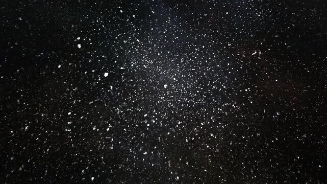 Slow Motion Particle Explosion in Vivid Colors