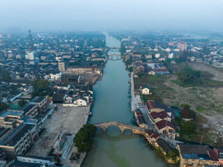 Obraz premium Ancient Shuanglin Town Huzhou China Aerial View with Traditional Bridges