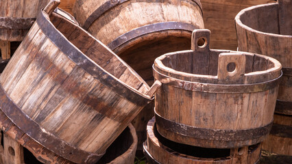 Rustic handmade wooden tubs with metal hoops