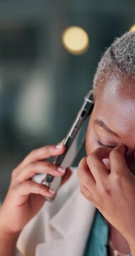 Angry, business and black woman with phone call at night for bad news, audit mistake and fraud. Frustrated, person and mobile for investment scam, financial error and overtime with company bankruptcy