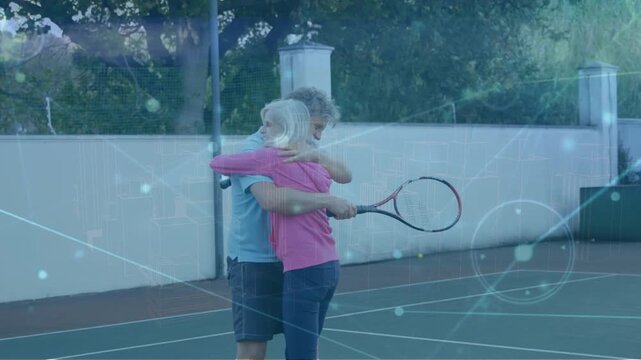 Animation of network of connections over caucasian couple on tennis court