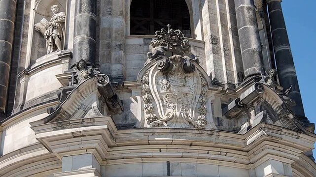 The Baroque fa&ccedil;ade of Dresden Cathedral with the royal coat of arms and sculptures of saints.
