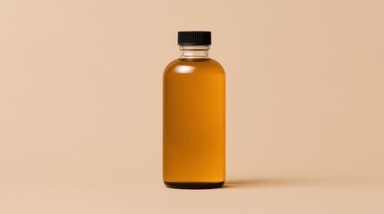 A clear glass bottle filled with amber liquid, featuring a black screw cap, set against a light beige background.
