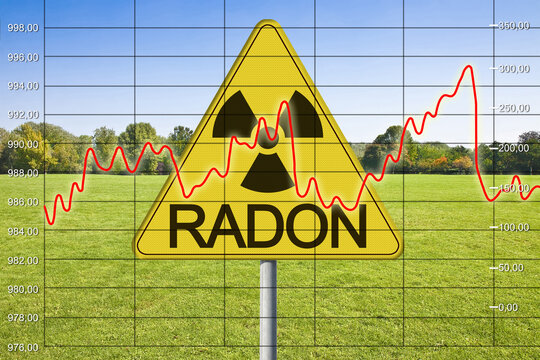 Danger of radioactive contamination from RADON GAS - concept with warning symbol of radioactivity on road sign and check-up chart about radon contamination