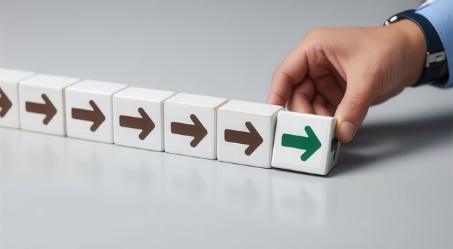 Businessman changing direction with wooden block showing green upward arrow, concept of change, decision making, and leadership