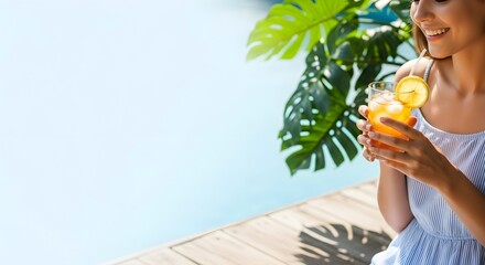 Woman holding drink outdoors