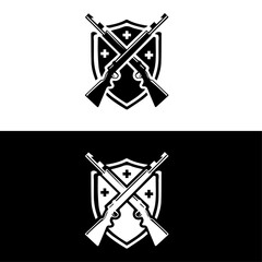 Fototapeta premium Vintage hunting club logo with crossed rifles and shield emblem
