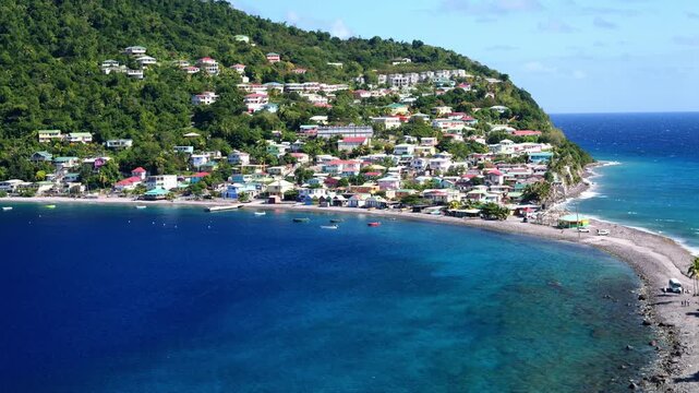 The village of Scotts Head on the southern coast of the Caribbean island of Dominica. Taken from the top of Scotts Head Peninsula or Cachacrou on a clear, sunny day.