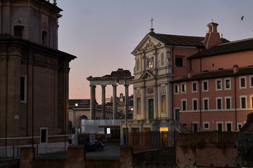 View of Mamertine Prison and Ancient Roman Forum Ruins at Sunset