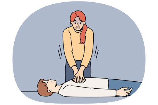 Woman nervous, giving heart massage to man fainted, pressing on chest muscles. Training in first aid and rescue of person with sudden heart failure or impaired cardio functions of body
