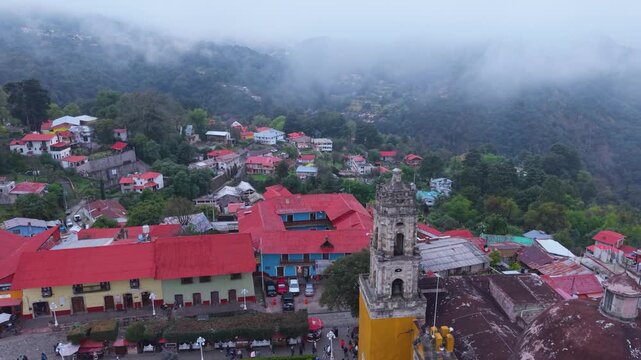 Mineral del Chico town wrapped in fog captured from the air, Hidalgo, Mexico