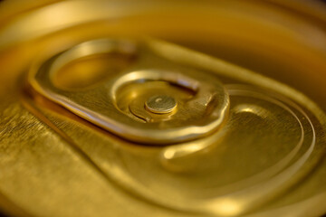 Macro of Gold Aluminum Can Pull Tab