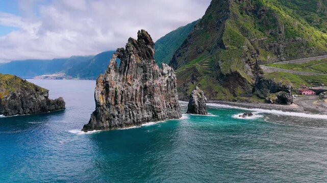Drone footage of Ilheus da Ribeira da Janela rock stacks along the Atlantic coast of Madeira Island