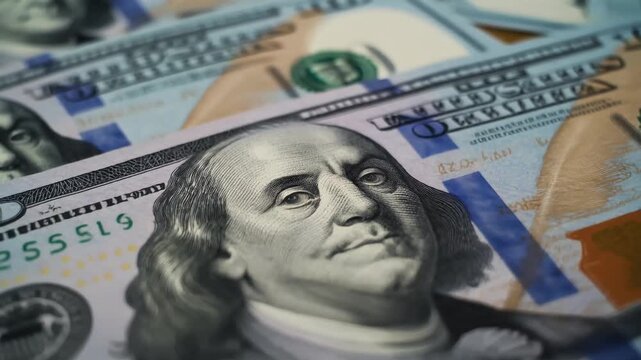 Macro of dollar bills overlapping with crisp texture