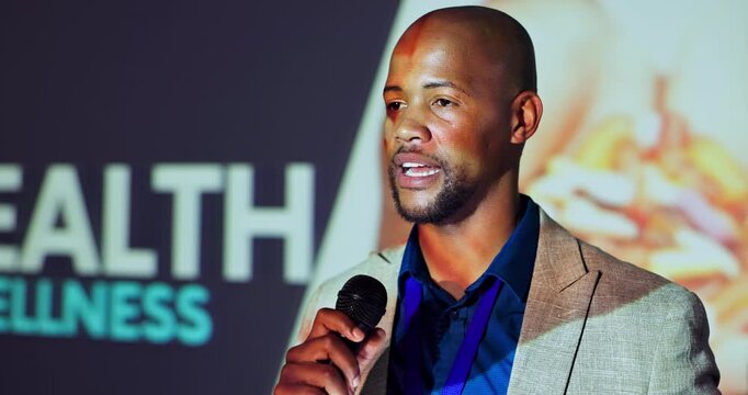 Speaker, black man and microphone for healthcare conference, innovation and share information. African, presenter and employee with seminar for medical research, communication and global education