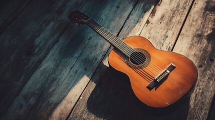 Obraz premium Aged Sunburst Acoustic Guitar Leaning Against Rustic Wooden Wall