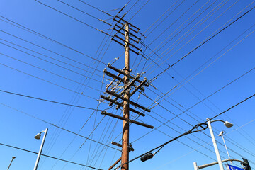 A utility pole with distribution of power lines