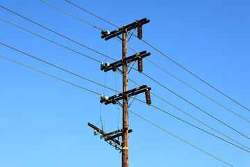 A utility pole with distribution of power lines