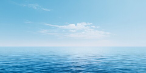 Obraz premium Large body of water with a few clouds in the sky