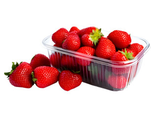 In a plastic container, fresh red strawberries, cut out