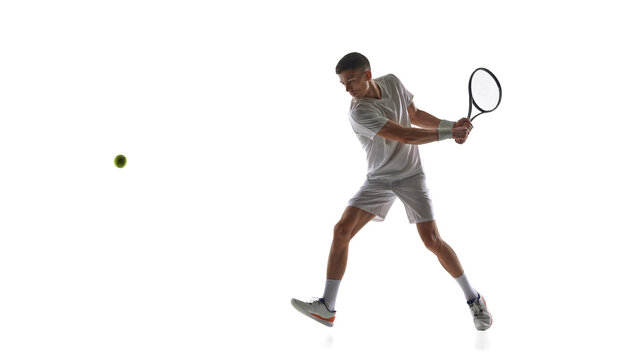 Tennis player two handed backhand preparation isolated on white background. Concept of backhand setup drills, stroke preparation training, tennis coaching materials, sports education visuals.