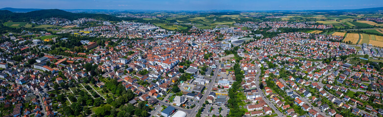 Obraz premium Aerial panoramic view of the city Winnenden in Germany on a sunny spring afternoon.