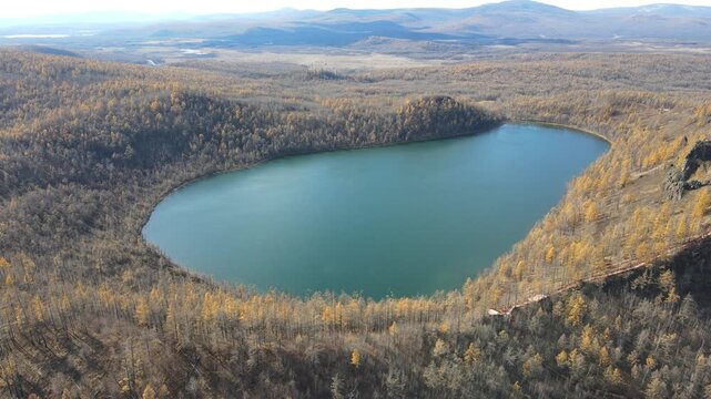Aerial Pull Back Revealing  Heavenly Lake in Autumn, Inner Mongolia, China

